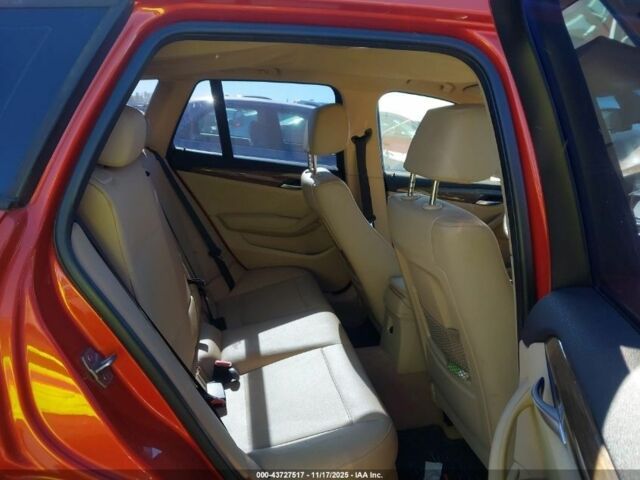 Оранжевый БМВ Х1, объемом двигателя 2 л и пробегом 140 тыс. км за 8500 $, фото 7 на Automoto.ua