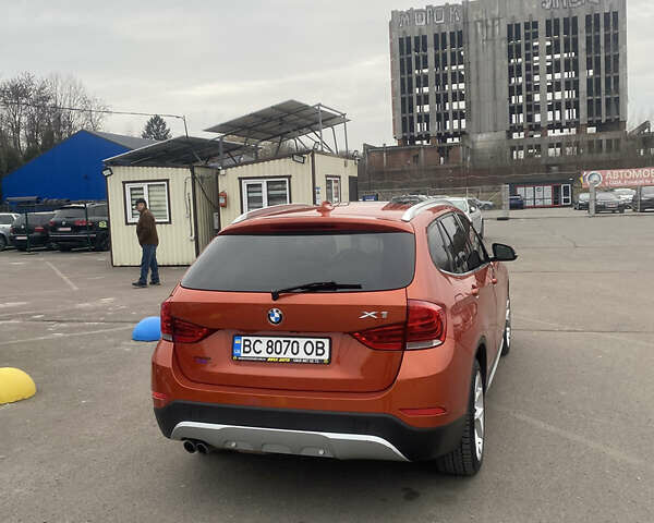Оранжевый БМВ Х1, объемом двигателя 2 л и пробегом 287 тыс. км за 11800 $, фото 4 на Automoto.ua