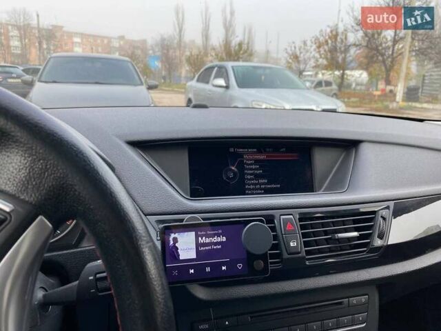 Оранжевый БМВ Х1, объемом двигателя 2 л и пробегом 236 тыс. км за 14000 $, фото 5 на Automoto.ua