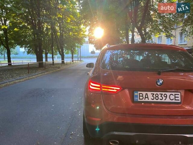 Оранжевый БМВ Х1, объемом двигателя 2 л и пробегом 236 тыс. км за 14000 $, фото 2 на Automoto.ua
