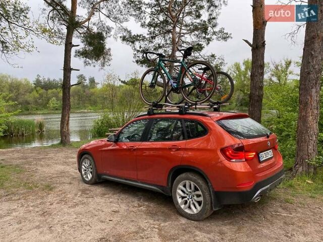 Оранжевый БМВ Х1, объемом двигателя 2 л и пробегом 236 тыс. км за 14000 $, фото 1 на Automoto.ua