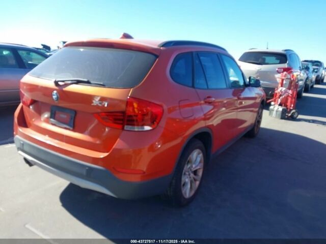 Оранжевый БМВ Х1, объемом двигателя 2 л и пробегом 140 тыс. км за 8500 $, фото 5 на Automoto.ua