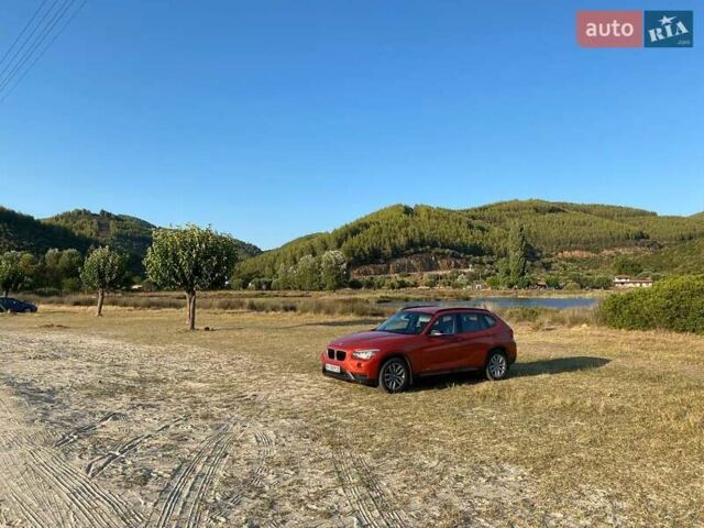 Оранжевый БМВ Х1, объемом двигателя 2 л и пробегом 236 тыс. км за 14000 $, фото 4 на Automoto.ua