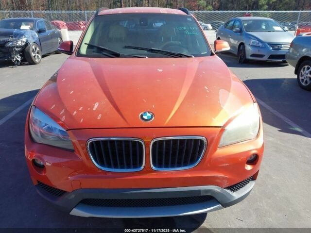 Оранжевый БМВ Х1, объемом двигателя 2 л и пробегом 140 тыс. км за 8500 $, фото 6 на Automoto.ua