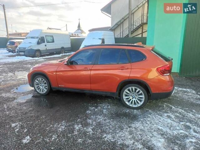 Оранжевый БМВ Х1, объемом двигателя 2 л и пробегом 183 тыс. км за 10500 $, фото 6 на Automoto.ua