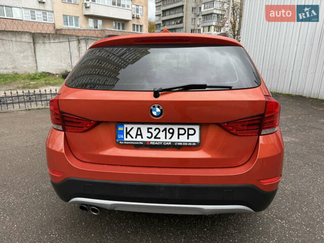 Помаранчевий БМВ Х1, об'ємом двигуна 2 л та пробігом 163 тис. км за 10400 $, фото 3 на Automoto.ua