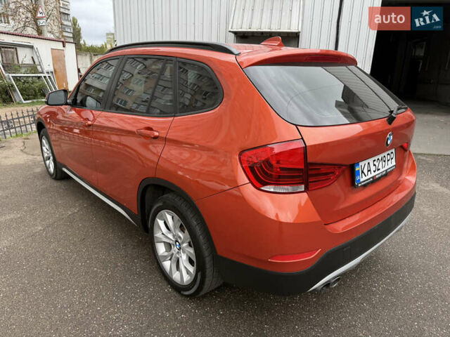 Помаранчевий БМВ Х1, об'ємом двигуна 2 л та пробігом 163 тис. км за 10400 $, фото 2 на Automoto.ua