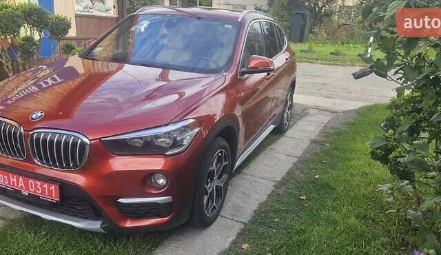 Оранжевый БМВ Х1, объемом двигателя 2 л и пробегом 65 тыс. км за 21600 $, фото 2 на Automoto.ua