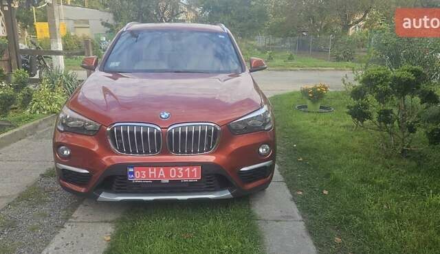 Оранжевый БМВ Х1, объемом двигателя 2 л и пробегом 65 тыс. км за 21600 $, фото 1 на Automoto.ua