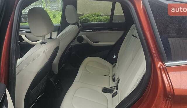 Оранжевый БМВ Х1, объемом двигателя 2 л и пробегом 65 тыс. км за 21600 $, фото 8 на Automoto.ua