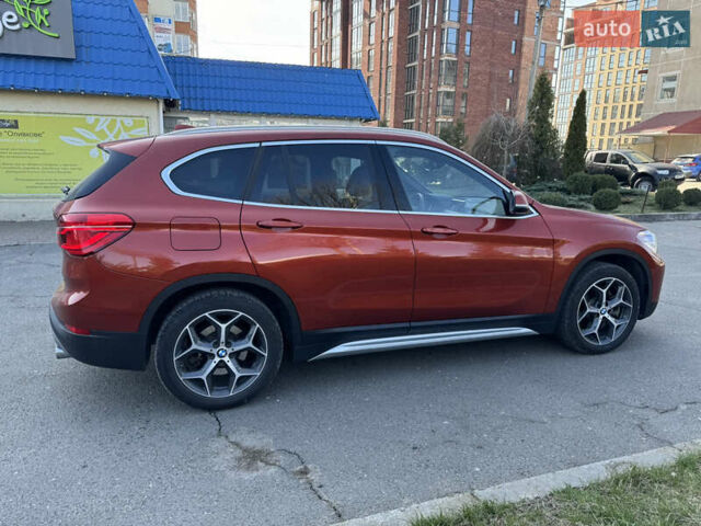 Оранжевый БМВ Х1, объемом двигателя 2 л и пробегом 75 тыс. км за 25500 $, фото 1 на Automoto.ua