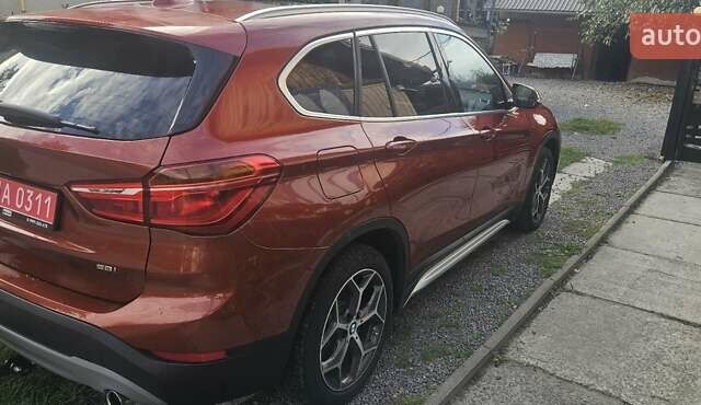 Оранжевый БМВ Х1, объемом двигателя 2 л и пробегом 65 тыс. км за 21600 $, фото 5 на Automoto.ua
