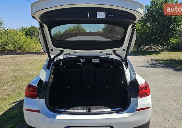 Белый БМВ X2, объемом двигателя 2 л и пробегом 84 тыс. км за 22800 $, фото 18 на Automoto.ua