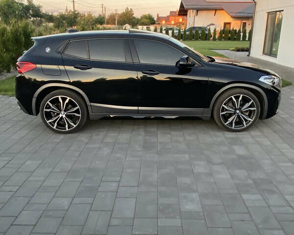Черный БМВ X2, объемом двигателя 2 л и пробегом 115 тыс. км за 21900 $, фото 1 на Automoto.ua