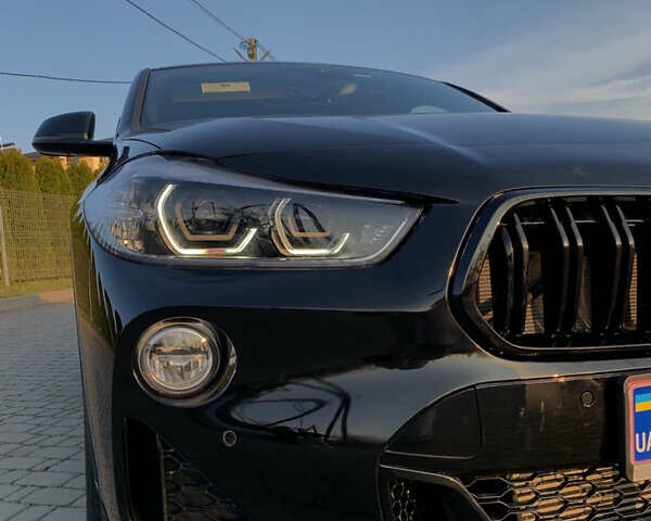 Черный БМВ X2, объемом двигателя 2 л и пробегом 135 тыс. км за 22499 $, фото 6 на Automoto.ua