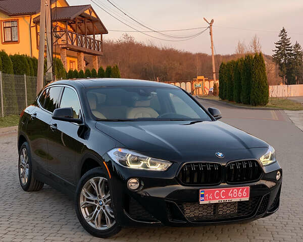 Черный БМВ X2, объемом двигателя 2 л и пробегом 135 тыс. км за 22499 $, фото 1 на Automoto.ua