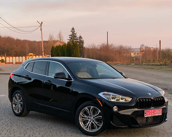 Черный БМВ X2, объемом двигателя 2 л и пробегом 135 тыс. км за 22699 $, фото 2 на Automoto.ua