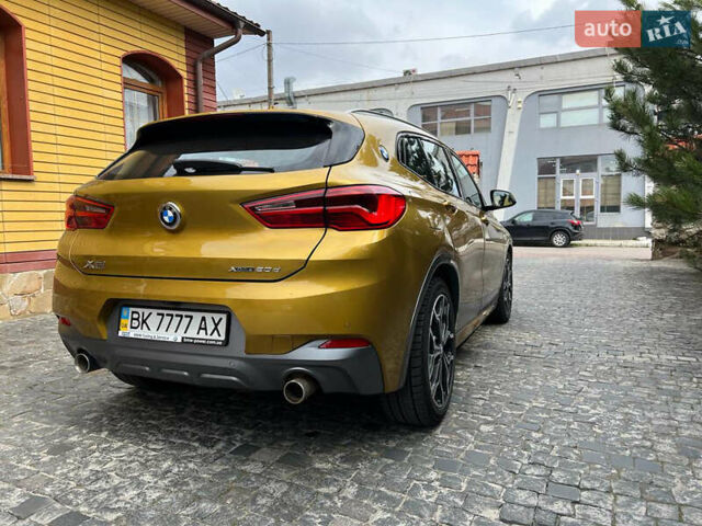 Желтый БМВ X2, объемом двигателя 2 л и пробегом 96 тыс. км за 30800 $, фото 6 на Automoto.ua