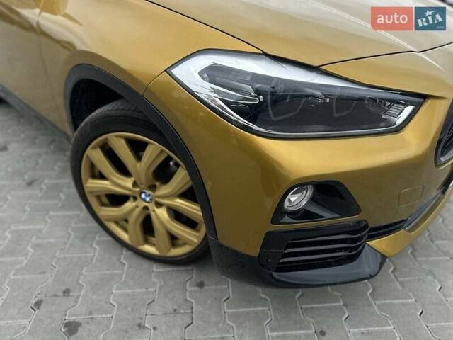 Желтый БМВ X2, объемом двигателя 2 л и пробегом 63 тыс. км за 18800 $, фото 19 на Automoto.ua