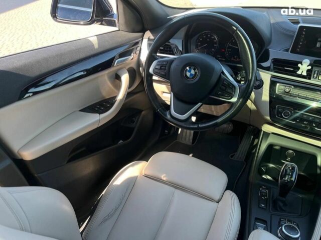Синий БМВ X2, объемом двигателя 2 л и пробегом 133 тыс. км за 20290 $, фото 23 на Automoto.ua