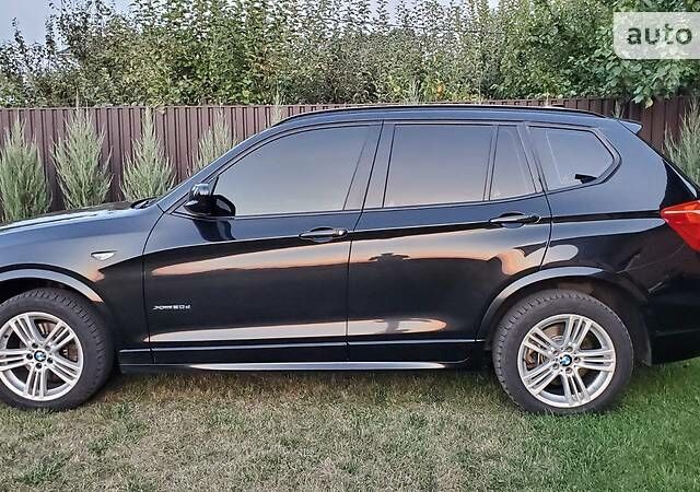 Чорний БМВ X3 M, об'ємом двигуна 2 л та пробігом 160 тис. км за 23900 $, фото 2 на Automoto.ua