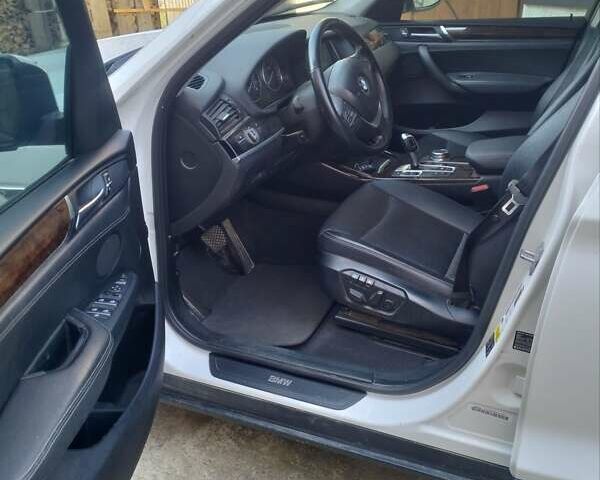 Білий БМВ Х3, об'ємом двигуна 2 л та пробігом 128 тис. км за 15000 $, фото 2 на Automoto.ua