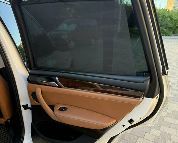Белый БМВ Х3, объемом двигателя 2 л и пробегом 68 тыс. км за 18900 $, фото 30 на Automoto.ua