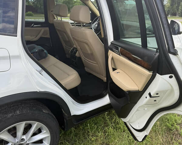 Білий БМВ Х3, об'ємом двигуна 2 л та пробігом 128 тис. км за 18200 $, фото 21 на Automoto.ua