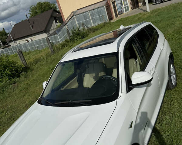 Білий БМВ Х3, об'ємом двигуна 2 л та пробігом 128 тис. км за 18200 $, фото 12 на Automoto.ua