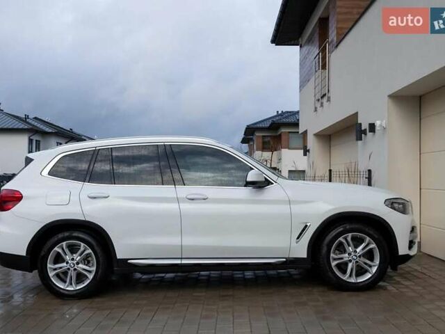 Білий БМВ Х3, об'ємом двигуна 2 л та пробігом 140 тис. км за 23800 $, фото 4 на Automoto.ua