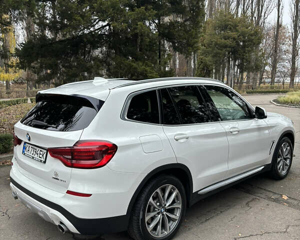 Белый БМВ Х3, объемом двигателя 2 л и пробегом 104 тыс. км за 29000 $, фото 4 на Automoto.ua