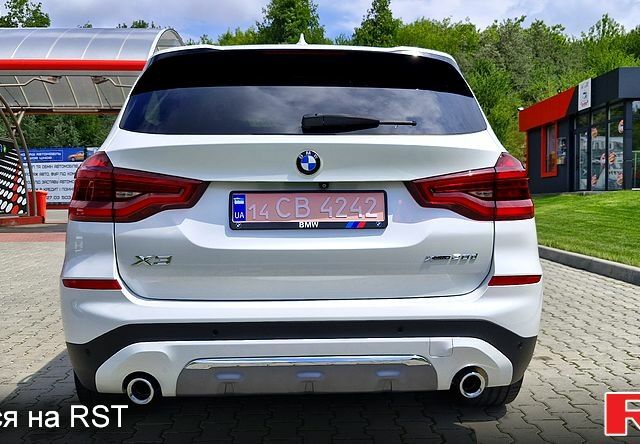 Білий БМВ Х3, об'ємом двигуна 2 л та пробігом 138 тис. км за 29999 $, фото 2 на Automoto.ua