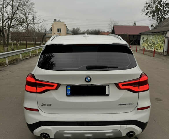 Белый БМВ Х3, объемом двигателя 3 л и пробегом 147 тыс. км за 34500 $, фото 3 на Automoto.ua