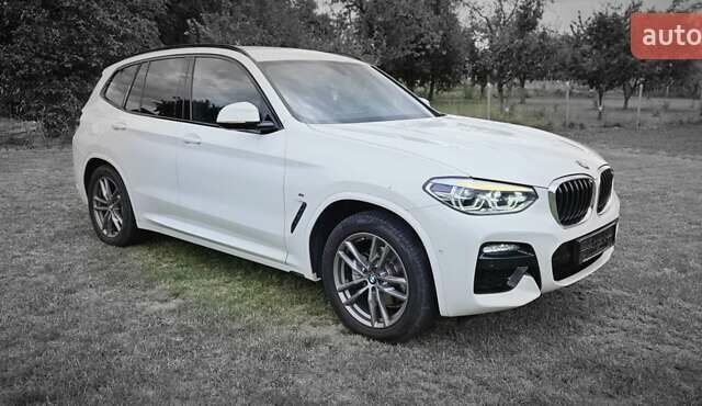 Білий БМВ Х3, об'ємом двигуна 2 л та пробігом 62 тис. км за 45500 $, фото 4 на Automoto.ua