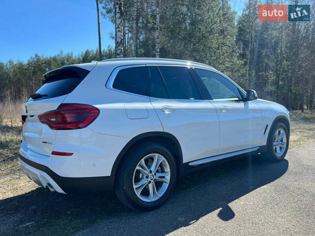 Білий БМВ Х3, об'ємом двигуна 2 л та пробігом 61 тис. км за 30100 $, фото 2 на Automoto.ua
