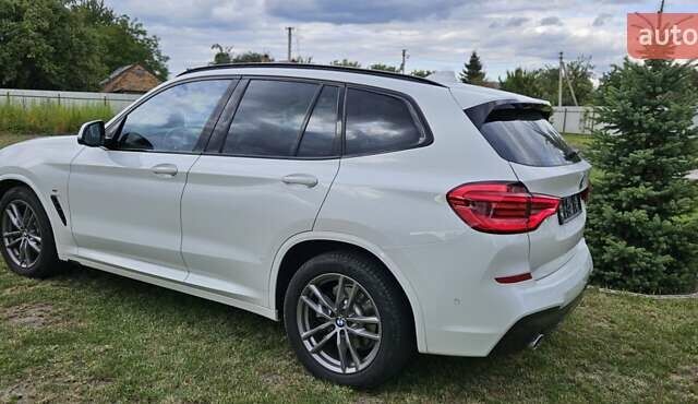 Білий БМВ Х3, об'ємом двигуна 2 л та пробігом 62 тис. км за 45500 $, фото 3 на Automoto.ua