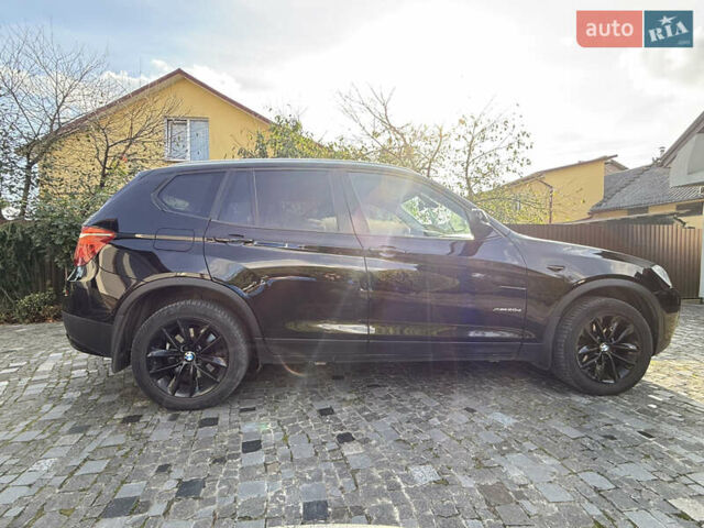 Чорний БМВ Х3, об'ємом двигуна 2 л та пробігом 300 тис. км за 14500 $, фото 4 на Automoto.ua