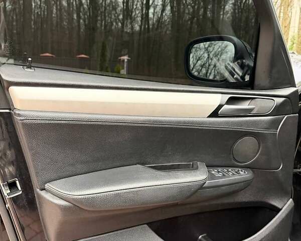 Чорний БМВ Х3, об'ємом двигуна 2 л та пробігом 202 тис. км за 13450 $, фото 2 на Automoto.ua