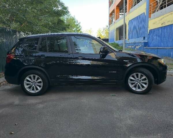 Чорний БМВ Х3, об'ємом двигуна 2 л та пробігом 124 тис. км за 19200 $, фото 2 на Automoto.ua