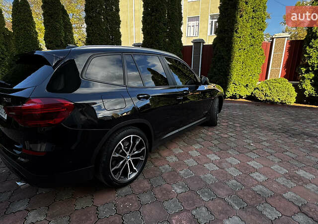 Черный БМВ Х3, объемом двигателя 2 л и пробегом 150 тыс. км за 33500 $, фото 6 на Automoto.ua