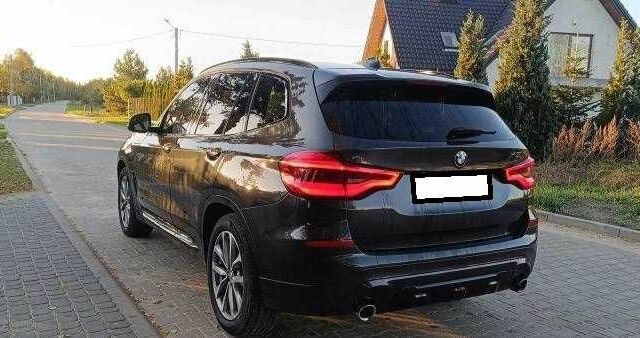 Черный БМВ Х3, объемом двигателя 2 л и пробегом 130 тыс. км за 17600 $, фото 4 на Automoto.ua