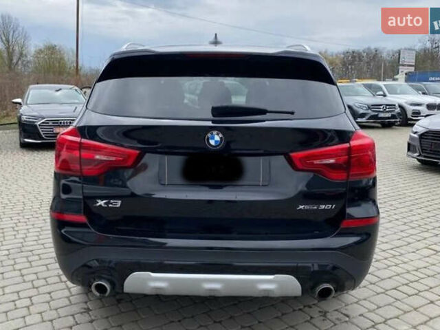 Чорний БМВ Х3, об'ємом двигуна 2 л та пробігом 157 тис. км за 26499 $, фото 2 на Automoto.ua
