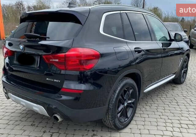 Чорний БМВ Х3, об'ємом двигуна 2 л та пробігом 157 тис. км за 26499 $, фото 4 на Automoto.ua