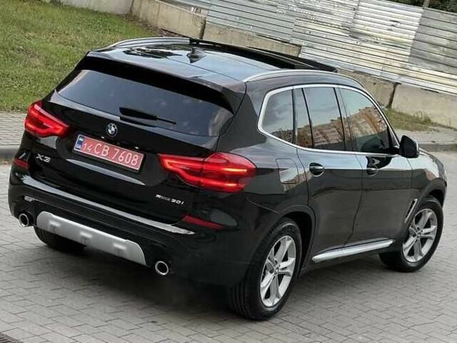 Чорний БМВ Х3, об'ємом двигуна 2 л та пробігом 131 тис. км за 21400 $, фото 5 на Automoto.ua