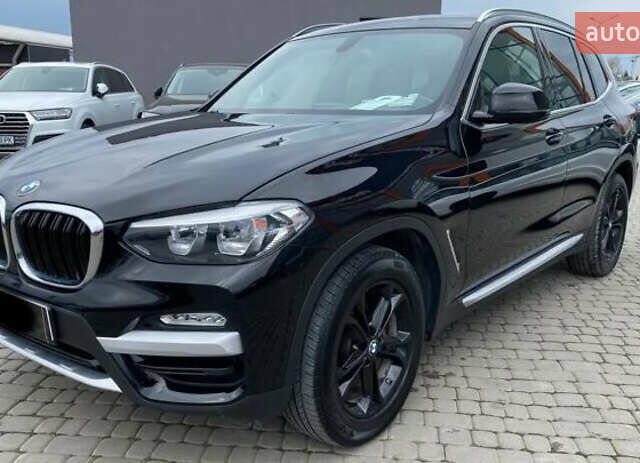 Чорний БМВ Х3, об'ємом двигуна 2 л та пробігом 157 тис. км за 26499 $, фото 1 на Automoto.ua
