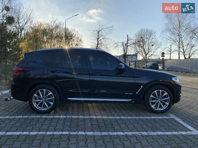 Черный БМВ Х3, объемом двигателя 2 л и пробегом 105 тыс. км за 29500 $, фото 6 на Automoto.ua