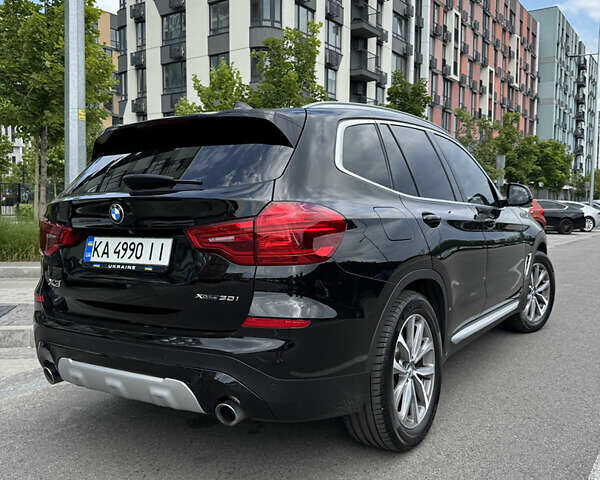 Чорний БМВ Х3, об'ємом двигуна 2 л та пробігом 110 тис. км за 31000 $, фото 3 на Automoto.ua