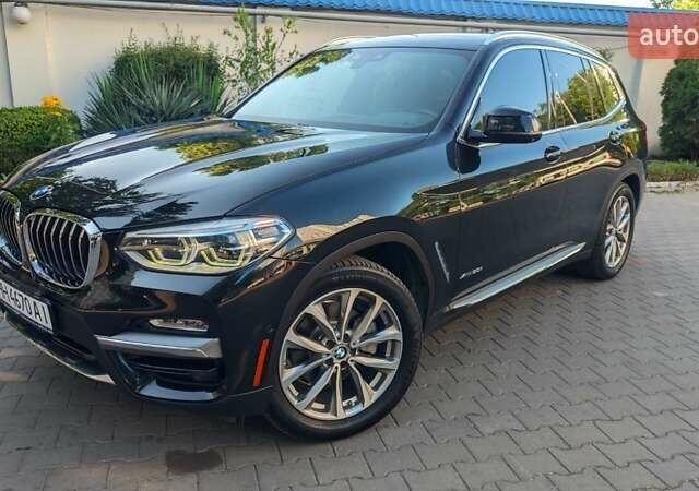 Черный БМВ Х3, объемом двигателя 2 л и пробегом 172 тыс. км за 29700 $, фото 1 на Automoto.ua