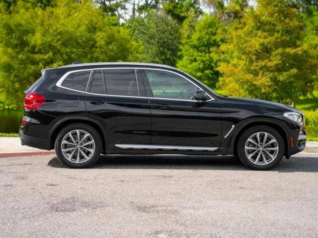 Чорний БМВ Х3, об'ємом двигуна 2 л та пробігом 30 тис. км за 11000 $, фото 3 на Automoto.ua