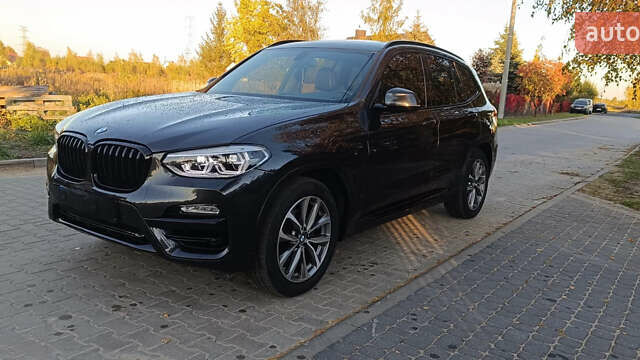 Чорний БМВ Х3, об'ємом двигуна 2 л та пробігом 78 тис. км за 28000 $, фото 4 на Automoto.ua